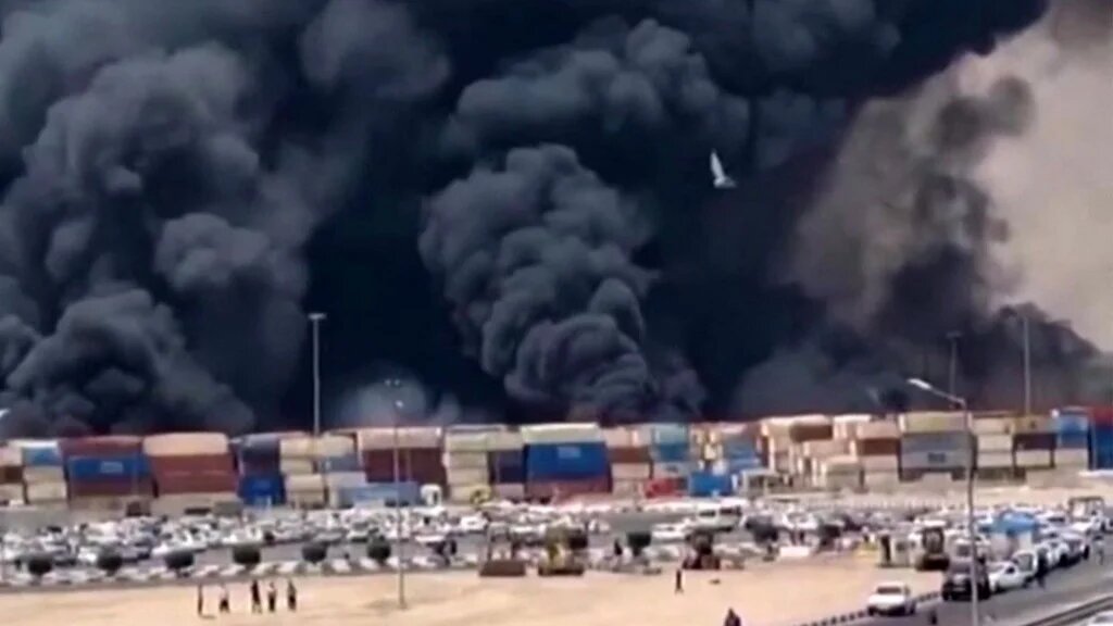 Thick black smoke was seen rising after an explosion at Bandar Abbas port, Iran, on 26 April 2025 (AFP)