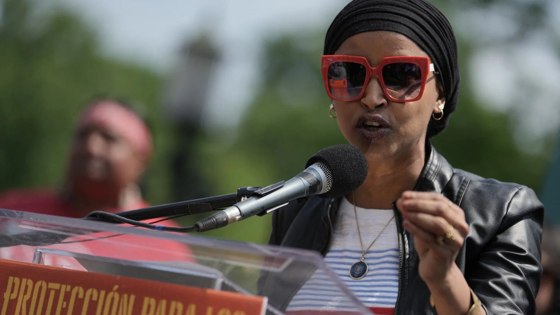 US Representative Ilhan Omar speaks to protesters near the White House during a rally against the Trump administration's immigration policies in Washington, DC on 1 May 2025 (Oliver Contreras/AFP)