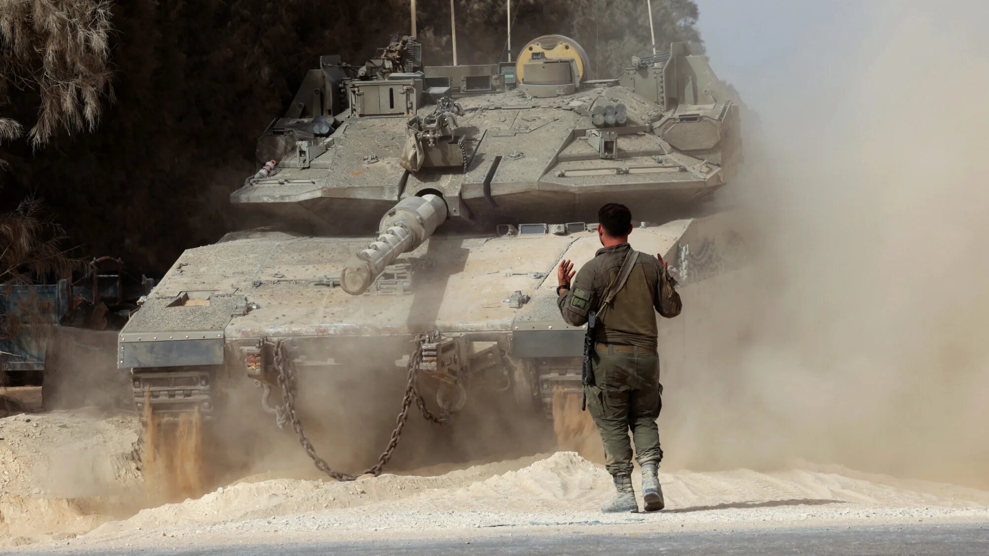 Israeli troops deploy at a position on Israel's boundary with the Gaza Strip on 1 July 2025 (AFP/Jack Guez)