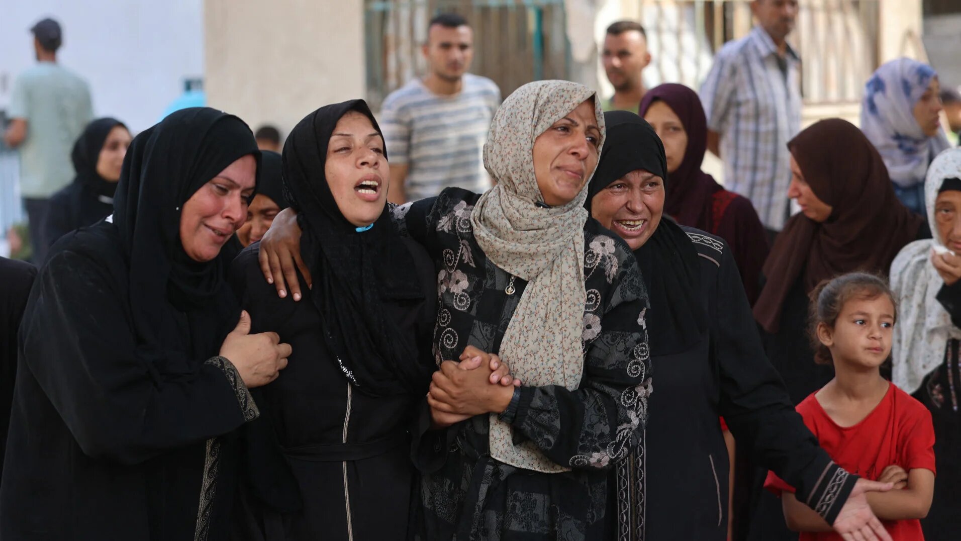 Palestinian women mourn a relative, killed in an Israeli strike, at Al-Shifa hospital in Gaza City on 9 July 2025 (Omar Al-Qattaa/AFP)