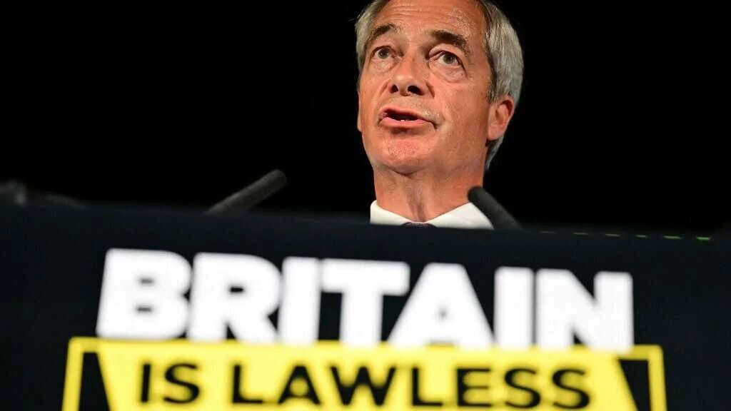 Reform UK Leader Nigel Farage speaks during a press conference, in London on July 28, 2025