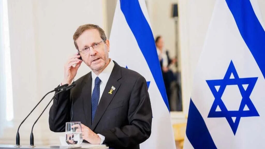 Israel's President Isaac Herzog listens in during a joint press conference with Latvia's President on August 5, 2025 at the Riga Castle in Riga, Latvia (AFP)