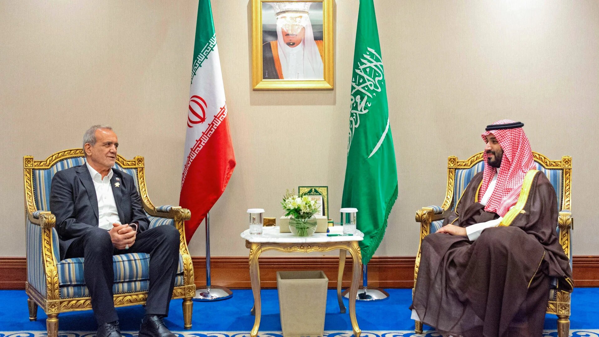 Saudi Arabia's Crown Prince Mohammed bin Salman (right) meets Iran's President Masoud Pezeshkian in Doha on 15 September 2025 during the Arab-Islamic emergency summit, held after Israel's attack on Qatar (Saudi Press Agency/AFP)
