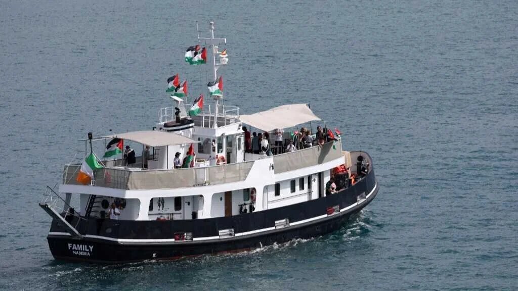 A boat carrying Swedish climate activist Greta Thunberg and activists, part of a civilian flotilla aiming at breaking the Israeli blockade of the Gaza Strip, leaves the port of Barcelona, on August 31. (AFP)