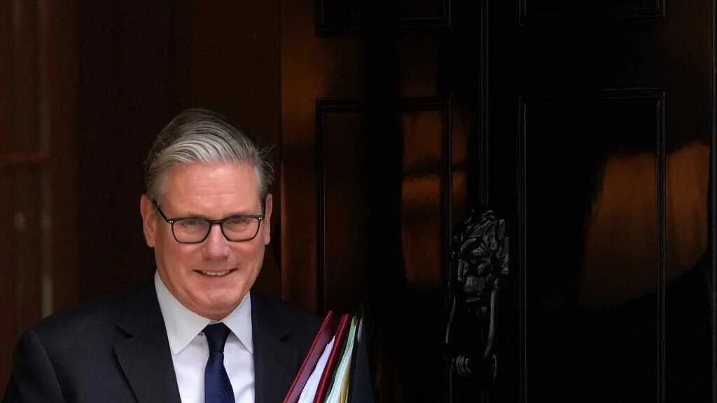 Britain's Prime Minister Keir Starmer leaves 10 Downing Street in central London on October 15, 2025, to take part in the weekly session of Prime Minister's Questions (PMQs).