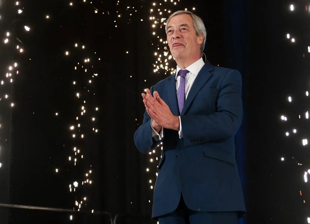 Reform UK Leader Nigel Farage speaks during a Reform UK party political rally at Newark Showground in Newark upon Trent, central England, on January 19, 2026.