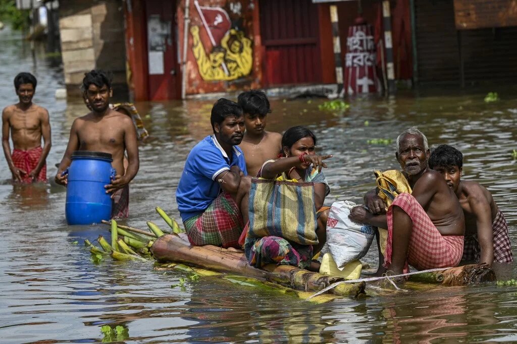 Le financement de l’aide aux pays en voie de développement et les pays moins avancés,  frappés par les dommages causés par le changement climatique, a divisé les participants à la COP26 (AFP/Dibyangshu Sarkar)