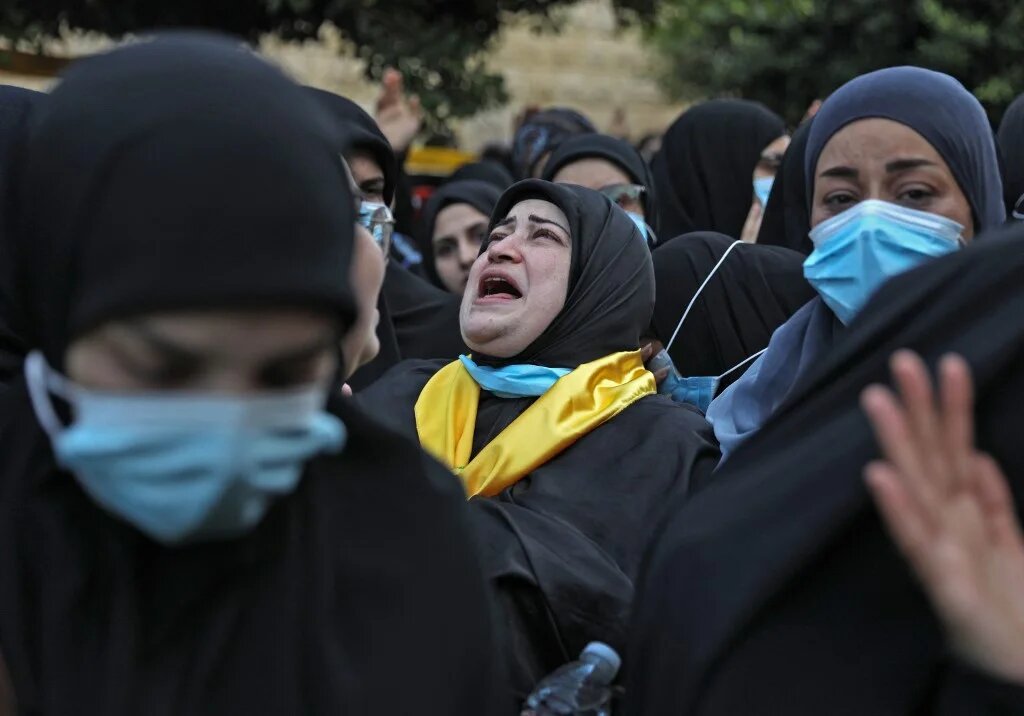 Funérailles des membres du Hezbollah tués lors d’affrontements au sud de Beyrouth, le 15 octobre 2021 (AFP/Ibrahim Amro)