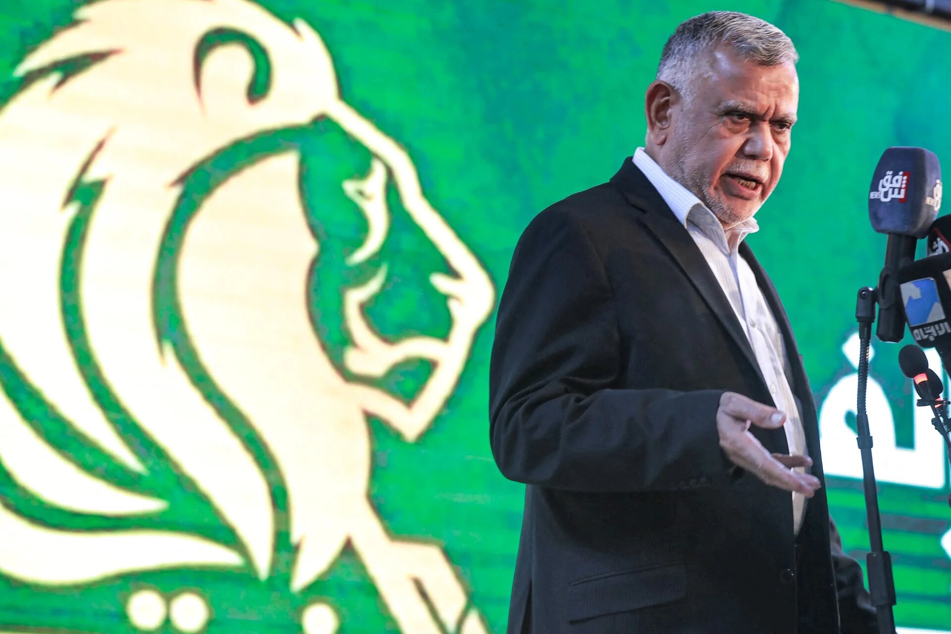 Hadi al-Amiri, head of the Fatah Alliance, speaks during a press conference in Iraq's capital Baghdad on 4 December, 2021 (AFP)