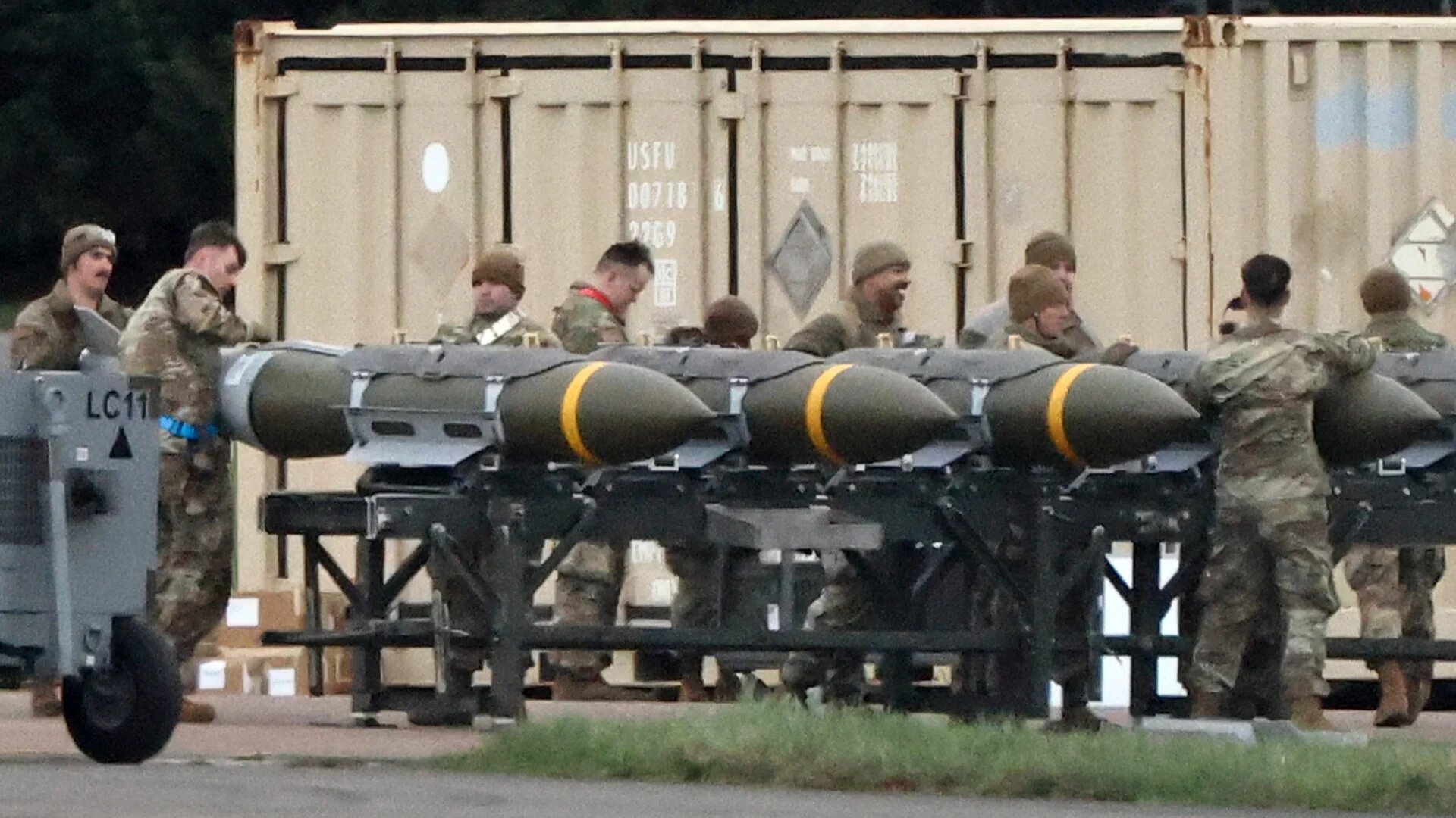 US Air Force personnel load munitions onto bombers at RAF Fairford in south-west England ahead of strikes on Iran on 10 March 2026 (Henry Nicholls/AFP)