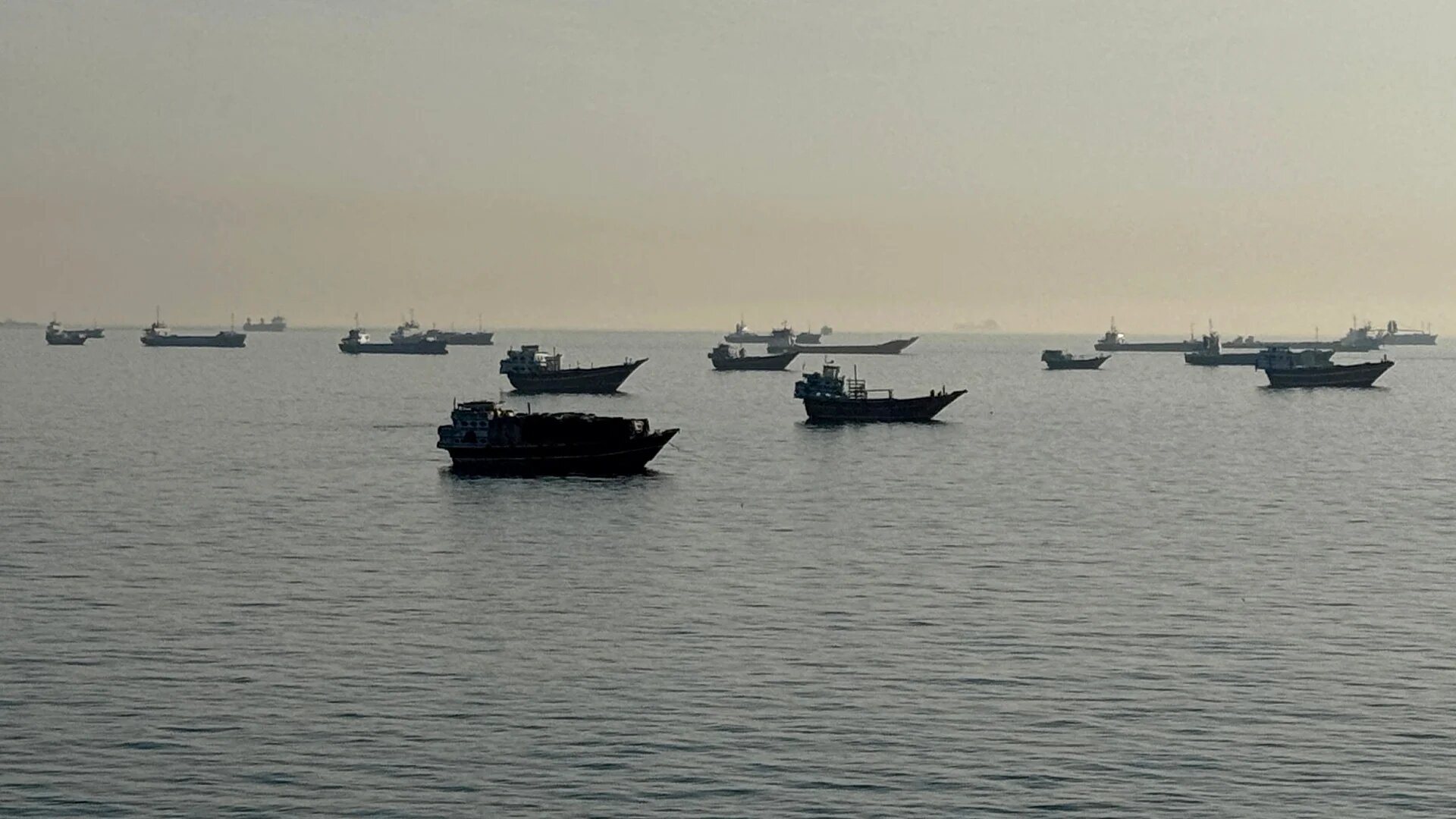 Vessels anchored in the Strait of Hormuz off the port city of Khasab, Oman, 17 May 2026 (AFP)