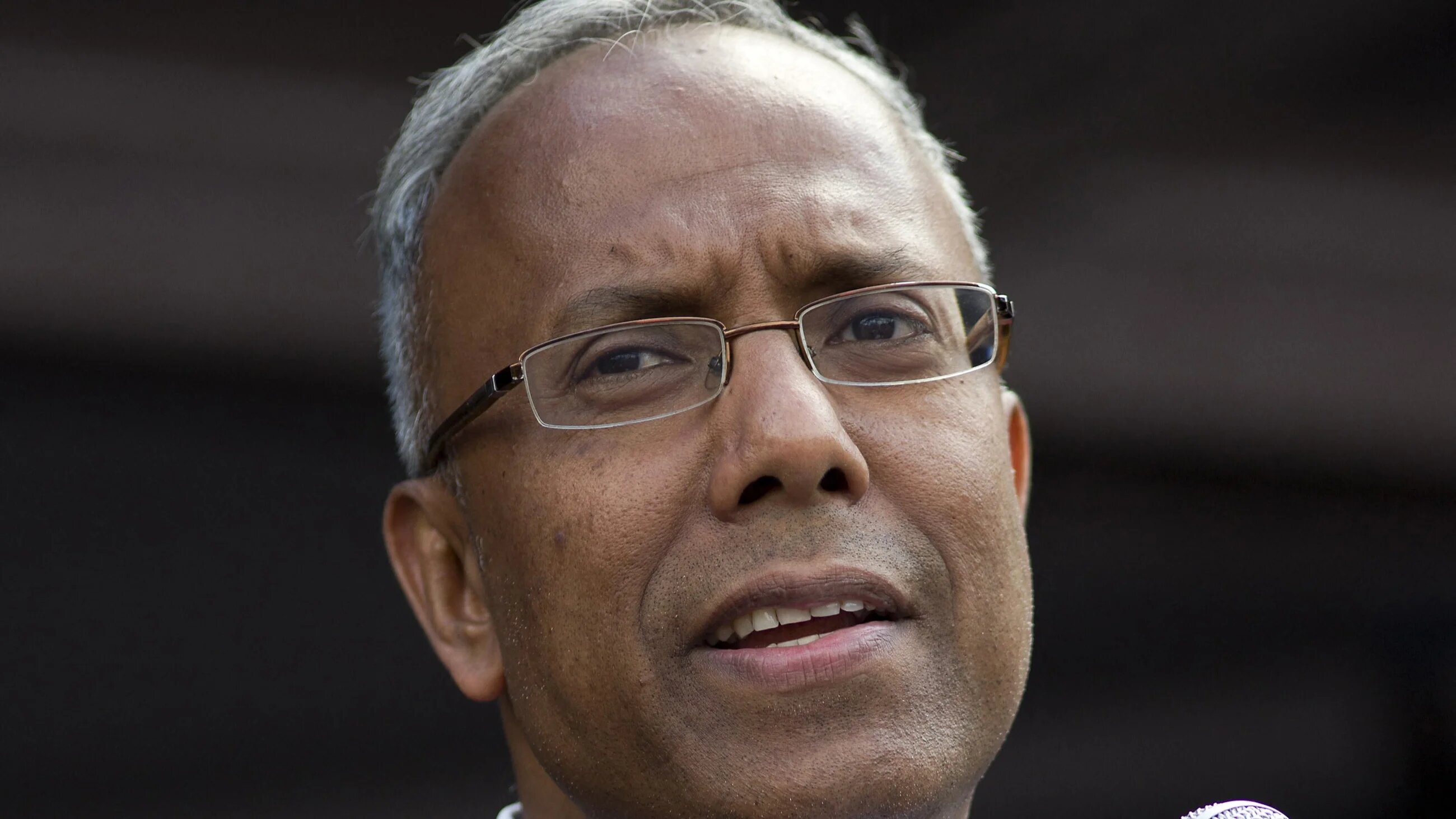 Lutfur Rahman, Labour Party mayor of Tower Hamlets, addresses an anti-austerity rally in Parliament Square in London on June 21, 2014.