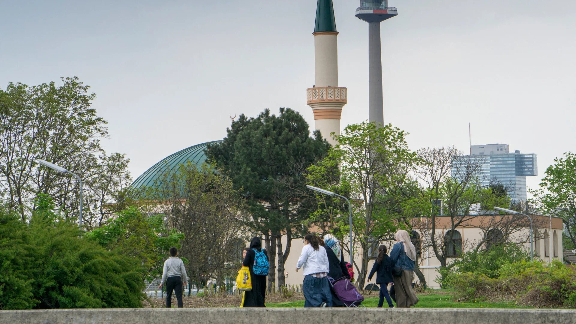 Muslim women with children walk towards a mosque at the Islam Centre of Vienna on 14 April 2017, as Austria debated Islamic kindergartens and the place of Muslims in public life (Joe Klamar/AFP)