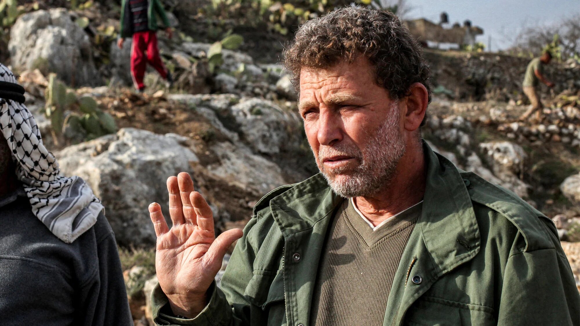 Nael Barghouti, the longest-serving Palestinian prisoner in Israeli detention, is pictured in Ramallah on 28 December 2013 (AFP/Abbas Momani)