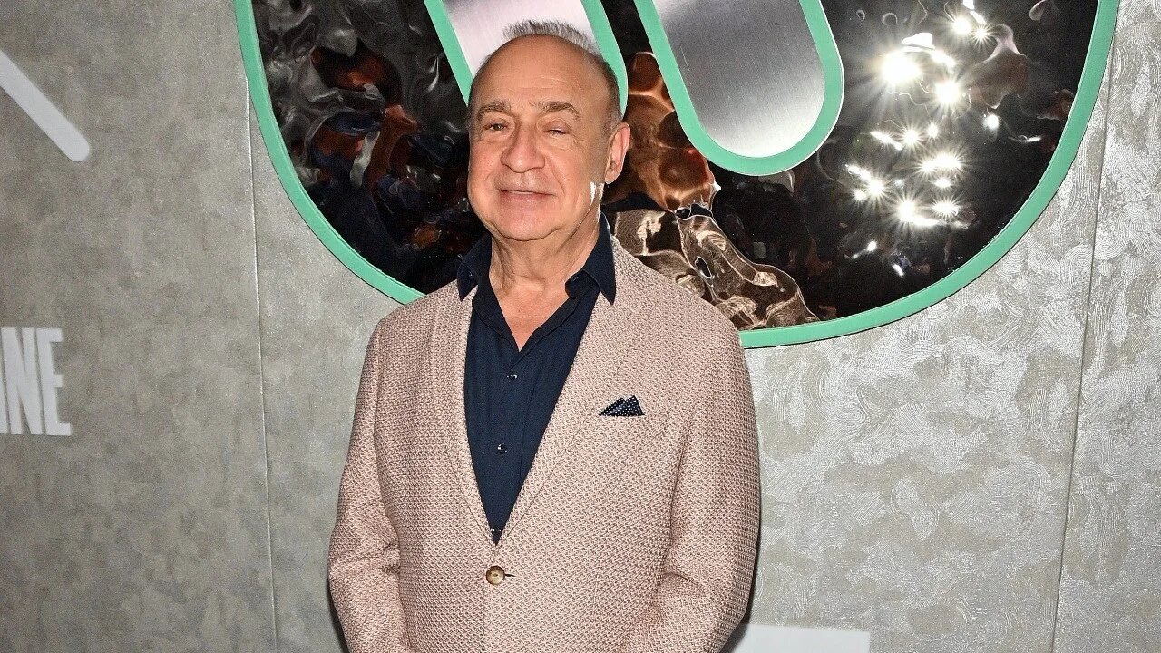 Sir Leonard Blavatnik appears on a red carpet at a Grammy awards party