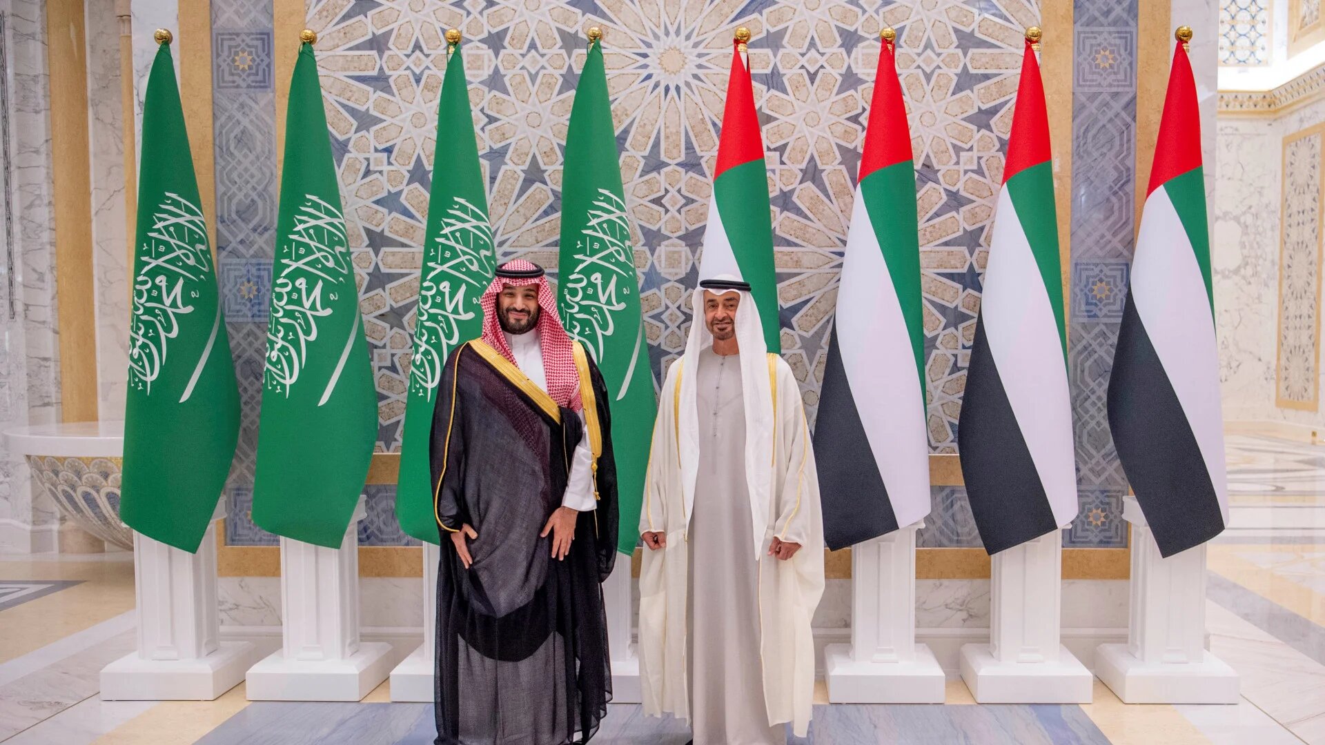 Saudi Crown Prince Mohammed bin Salman, right, meets Abu Dhabi Crown Prince Sheikh Mohammed bin Zayed al-Nahyan in Abu Dhabi on 7 December 2021 (Saudi Royal Court/Handout via Reuters)