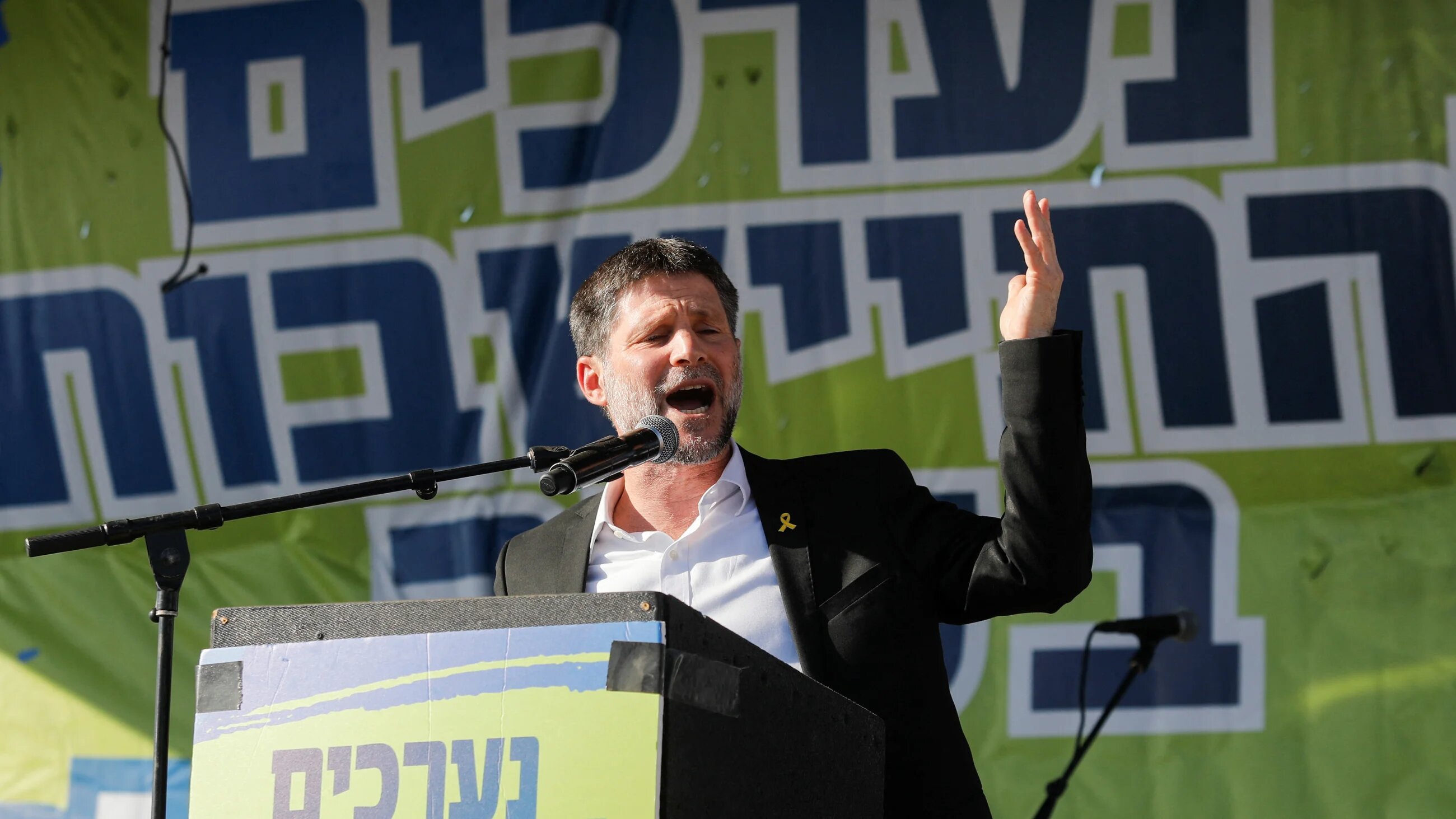 Israeli Finance Minister Bezalel Smotrich speaks while a conference on the resettlement of the Gaza Strip takes place, at an unspecified location in southern Israel, 21 October 2024 (Reuters/Tomer Appelbaum)