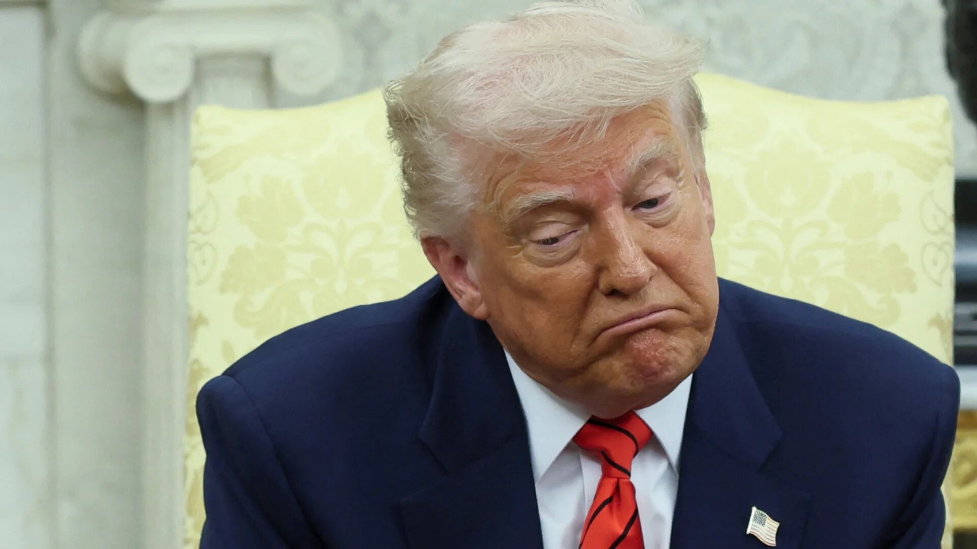 US President Donald Trump reacts during a meeting with the Canadian prime minister in the Oval Office at the White House in Washington, DC, on 6 May 2025 (Leah Millis/Reuters)
