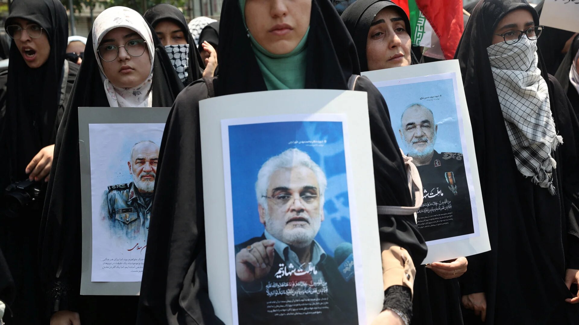 People attend an anti-Israeli protest in Tehran following Israeli air strikes on Iran, 13 June 2025 (Majid Asgaripour/Wana via Reuters)