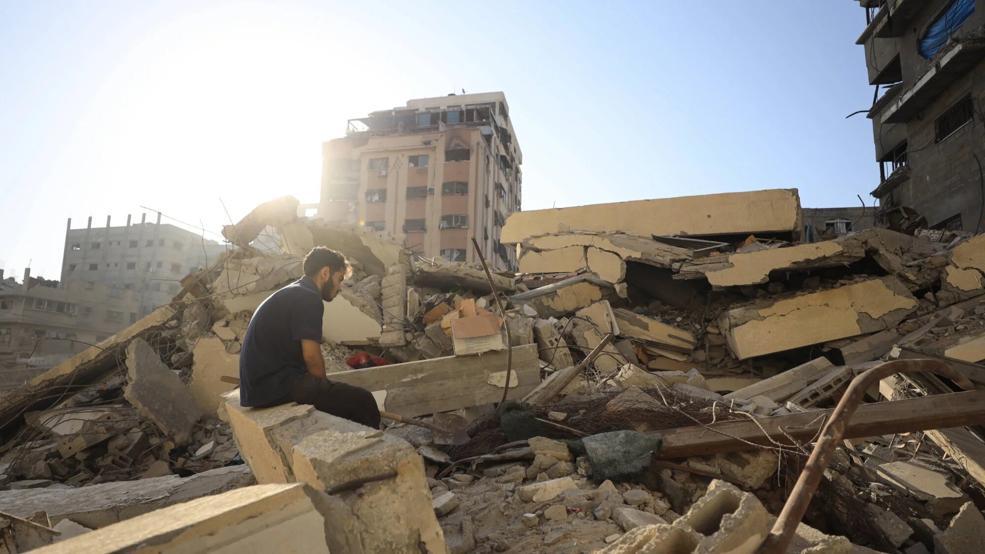 Palestinians inspect the damage at the site of an overnight Israeli strike on a house in In the Shati refugee camp, west of Gaza City, 9 September 2025 (IMAGO/APAimages via Reuters/Omar Ashtawy)