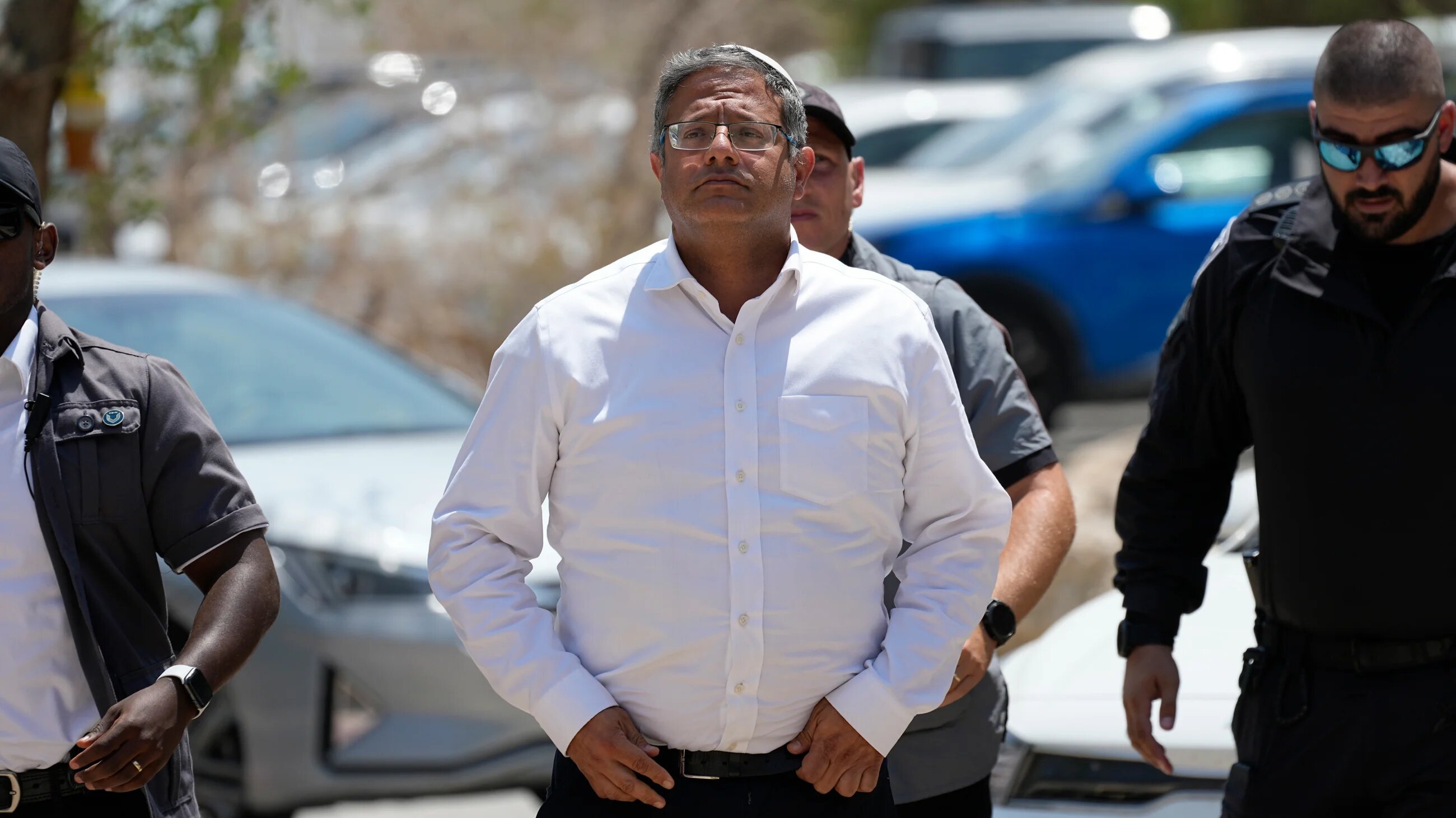 Israel's National Security Minister Itamar Ben Gvir arrives to the site of a rockslide that took place in the Ein Gedi Nature Reserve on 24 August 2023 (AP)