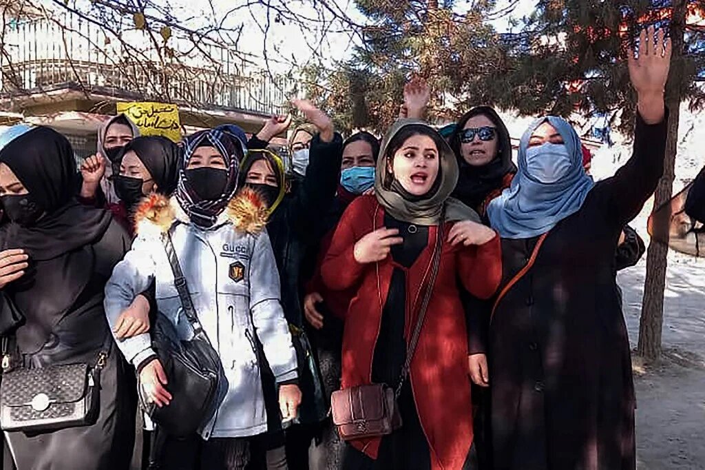 Afghan women chant slogans to protest against the ban on university education for women, in the capital Kabul, 22 December 2022 (AFP)