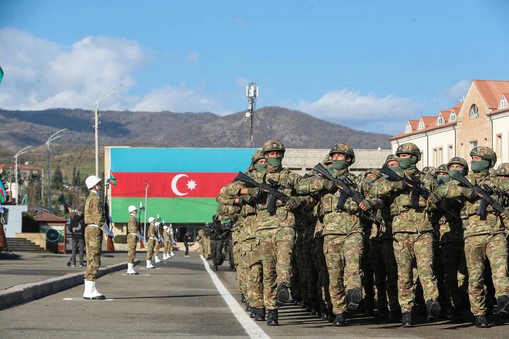Azerbaijani troops parade in the town of Khankendi in Nagorno-Karabakh in November 2023 (AFP)