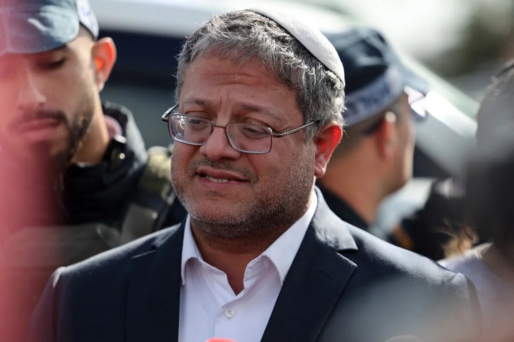 Israeli far-right minister Itamar Ben-Gvir speaks to the press at the scene of a shooting attack in the southern town of Kiryat Malakhi on 16 February 2024 (Ahmad Gharabli / AFP)