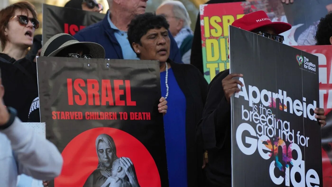 People attend a vigil in support of Palestinians in Gaza in Cape Town, South Africa on 13 August 2025 (Reuters)
