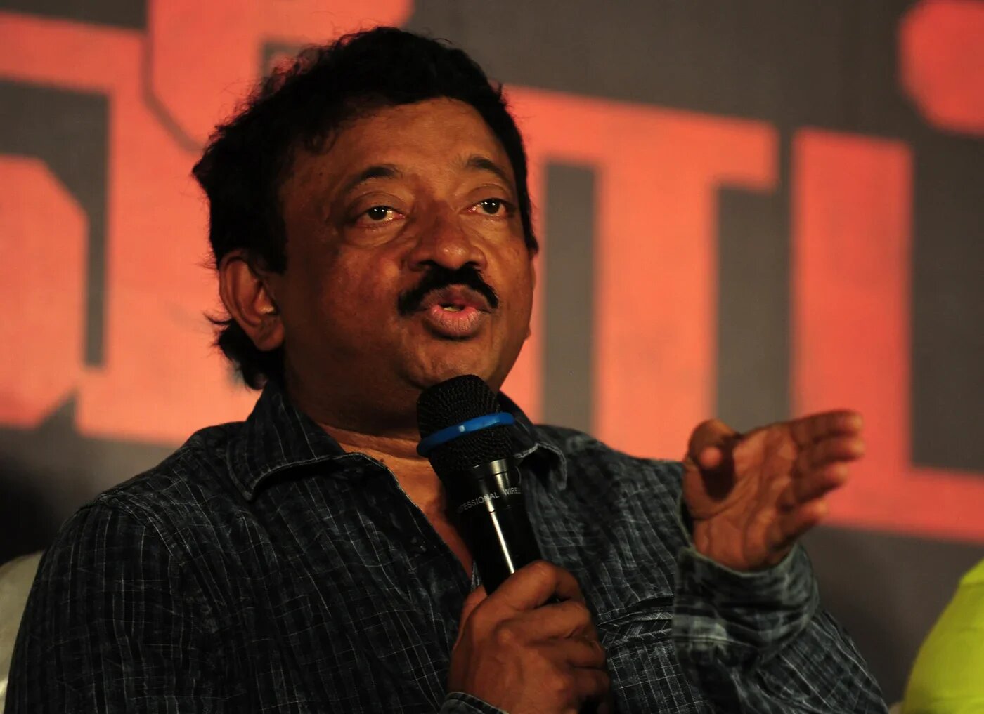 Filmmaker Ram Gopal Varma, known for his work in Hindi and Telugu films, gestures during a media event in Chennai (Arun Sankar/AFP)
