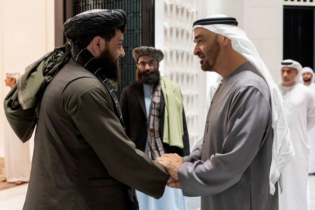 Mohammed bin Zayed bids farewell to Afghanistan's acting Defence Minister Mullah Mohammad Yaqoob at al-Shati Palace in Abu Dhabi (Reuters)