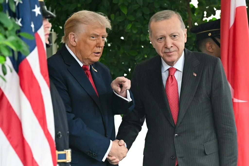 US President Donald Trump greets Turkey's President Recep Tayyip Erdogan as Erdogan arrives at the White House in Washington, DC on September 25, 2025. (SAUL LOEB / AFP)