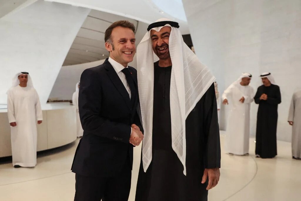 France's President Emmanuel Macron (L) meets with UAE's President Mohammed bin Zayed Al Nahyan during a visit to the Zayed National Museum in Abu Dhabi, in the United Arab Emirates, on 21 December 2025 (Ludovic Marin/AFP)