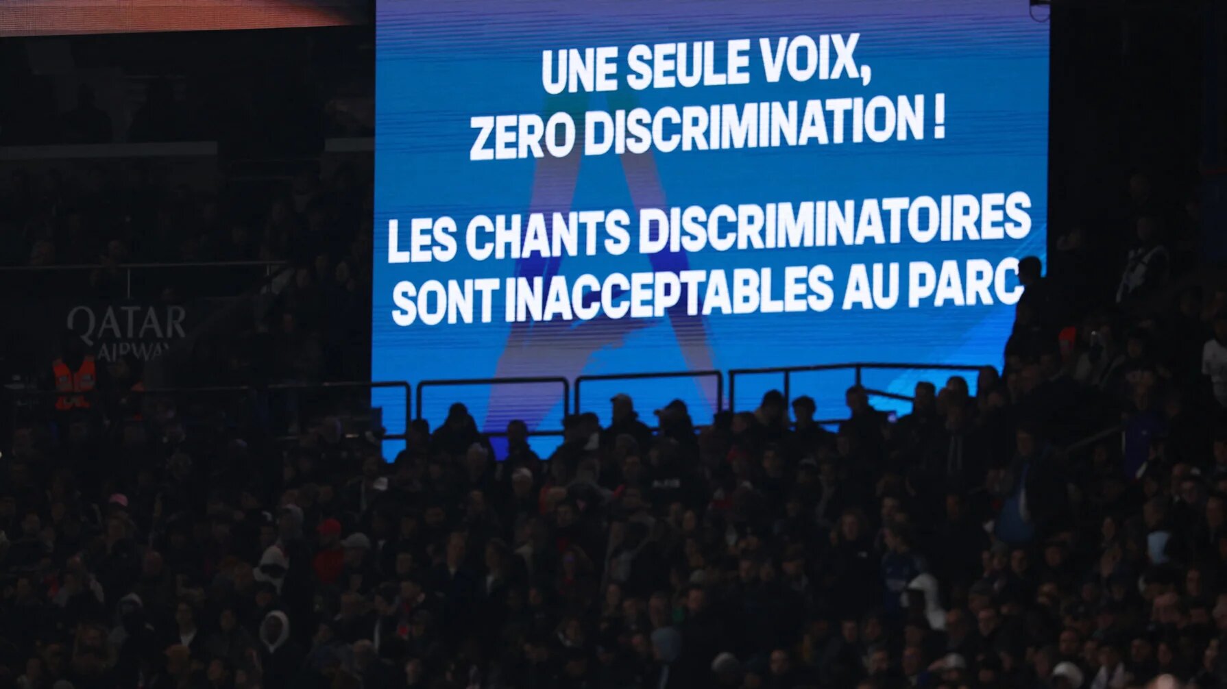 An anti-discrimination banner at a football game between Paris Saint-Germain and Olympique de Marseille on 17 March 2025 (Franck Fife/AFP)