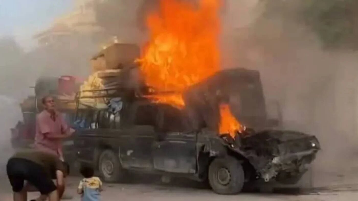A car carrying displaced Palestinians catches fire after an Israeli strike in Gaza City on 16 September 2025 (Screengrab/X)