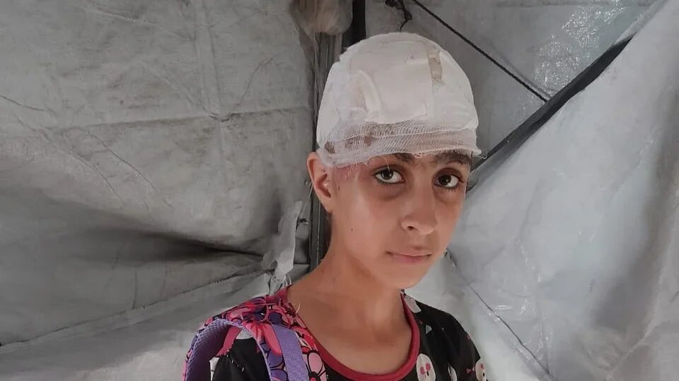 An image of Hala Shukri Dehliz in Gaza following the Israeli attacks (Eman Alhaj Ali/MEE)