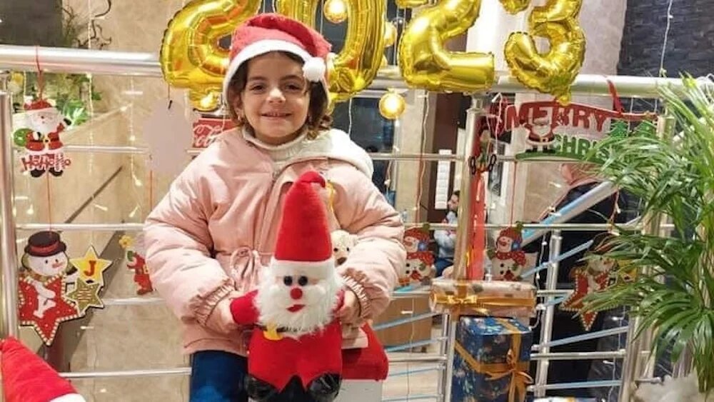 One of the author's nieces, pictured in Gaza in December 2023 before being killed in an Israeli air strike on the family's home on 27 September 2025 (Supplied)