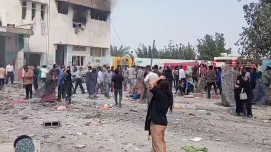 Video posted on pro-government Telegram accounts show Iranians searching through the destroyed school in Minab (Telegram)