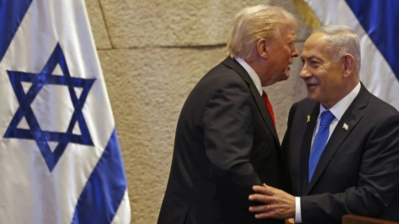 US President Donald Trump and Israel's Prime Minister Benjamin Netanyahu at the Israeli parliament in Jerusalem on 13 October 2025 (Jalaa Marey/AFP)