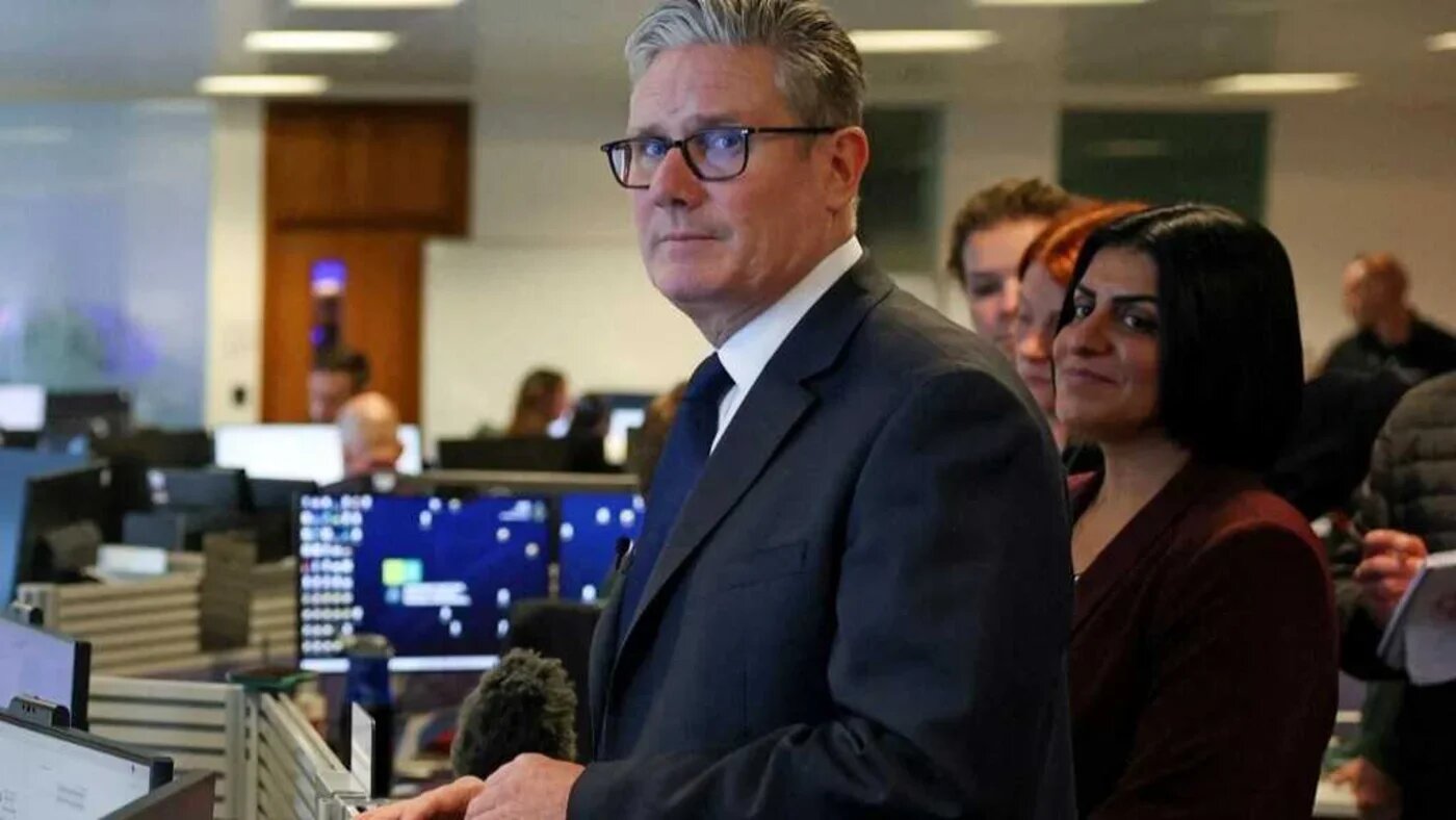 Britain's Prime Minister Keir Starmer and Home Secretary Shabana Mahmood visit the Greater Manchester Police headquarters on 3 October 2025 (Phil Noble/AFP)