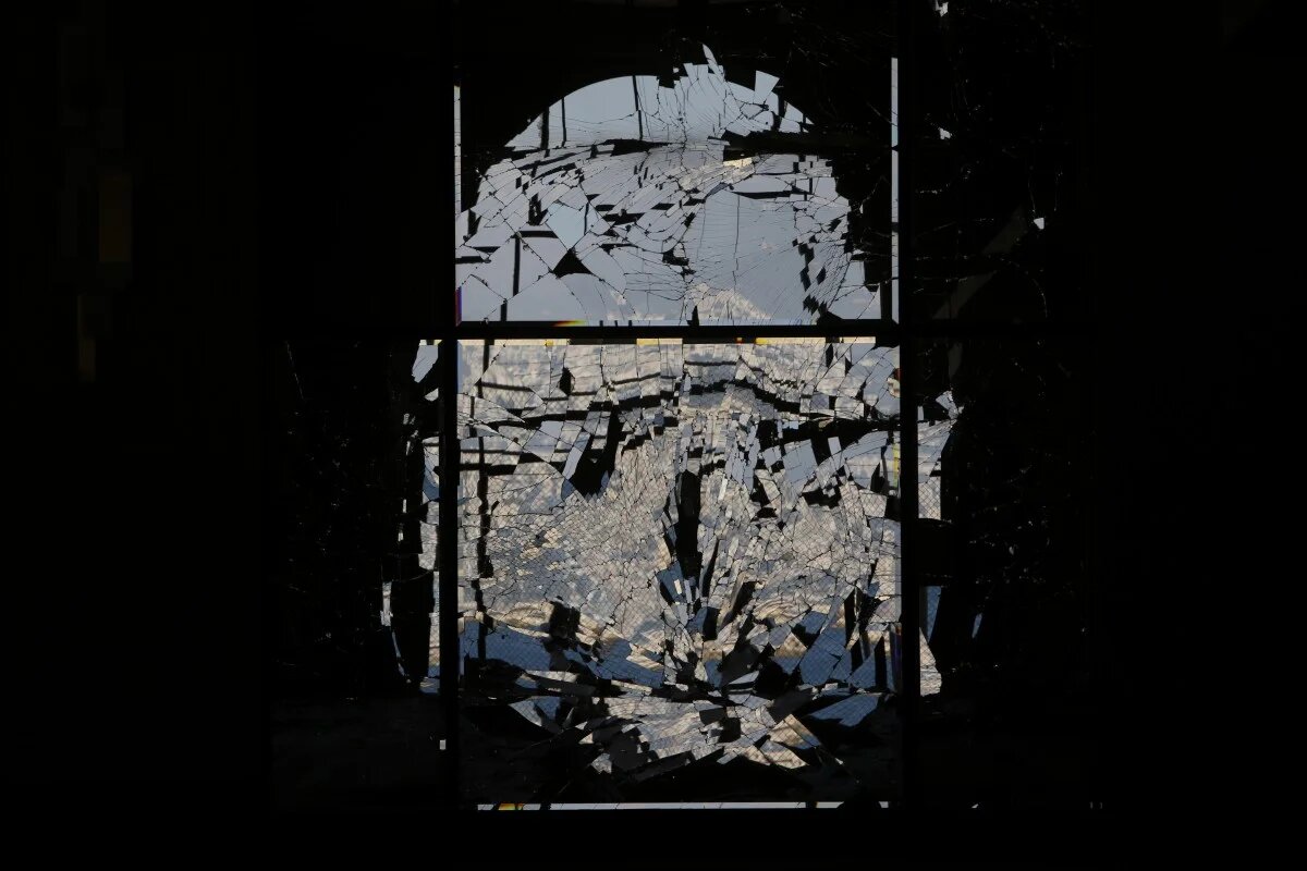 A shattered mirror inside the Beirut International Exhibition and Leisure Center