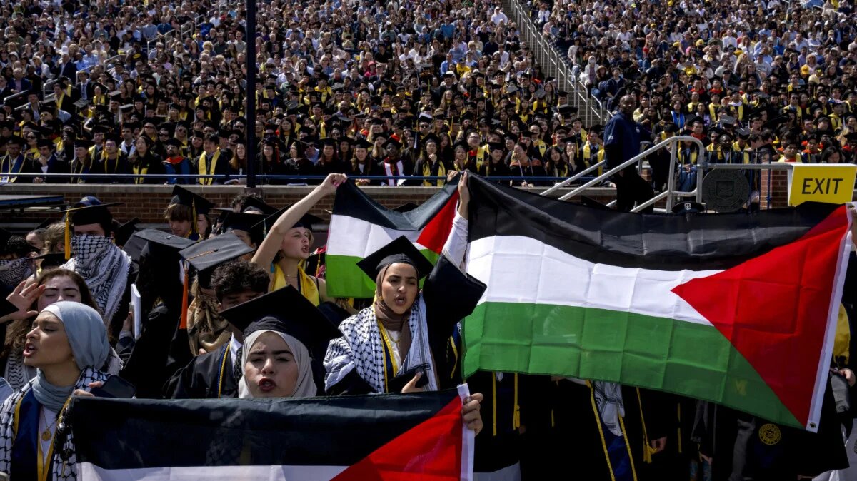 A pro-Palestinian protest during the University of Michigan's spring commencement ceremony on 4 May 2024 in Ann Arbor, Michigan (Nic Antaya/Getty Images/AFP)