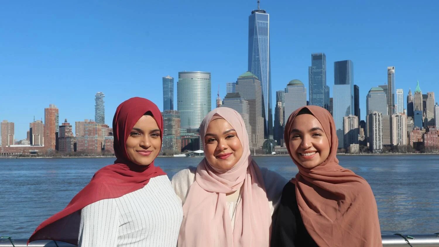 From left to right Muslim Foodies is made up of Jiniya Azad, Tahirah Baksh, and Sameen Choudhry (MEE/Zainab Iqbal)