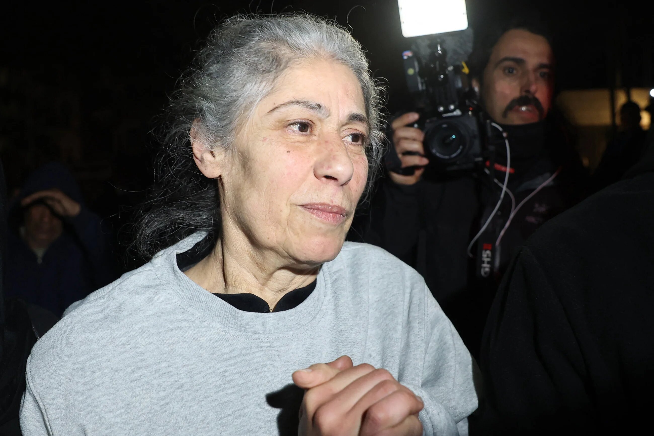 Images upon Khalida Jarrar's release showed her hair had turned white during her confinement since 26 December, 2023 (AFP/Zain Jaafar)