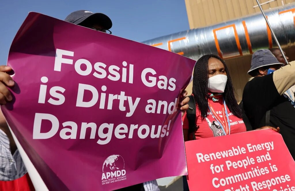 Demonstrators at the Cop27 climate conference in Sharm el-Sheikh, Egypt on 15 November 2022 (AFP)