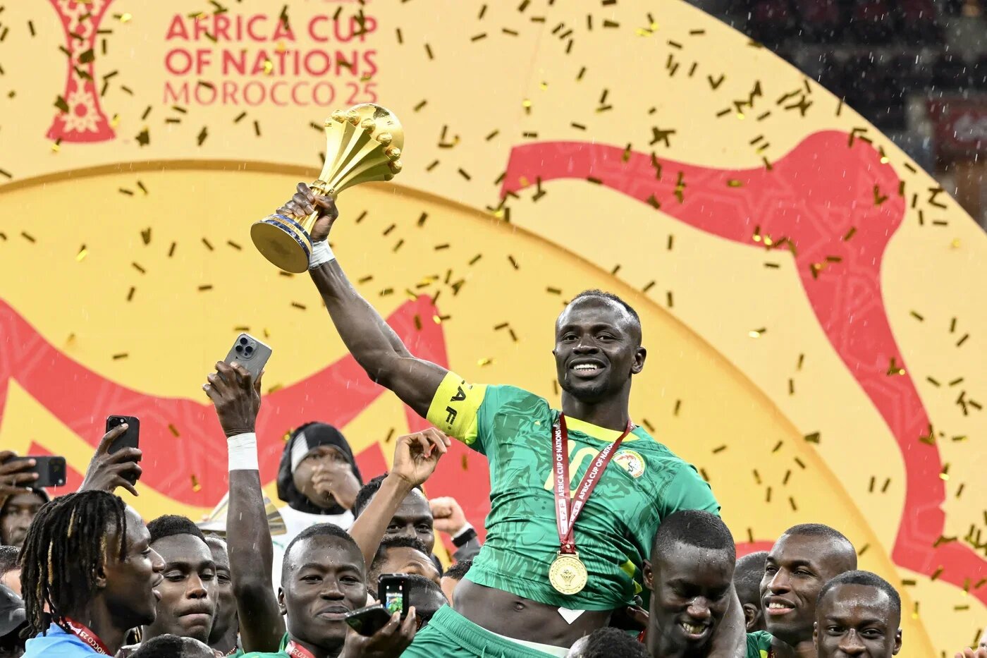 Senegal celebrate after winning the Africa Cup of Nations final against Morocco at the Prince Moulay Abdellah Stadium in Rabat on 18 January 2026 (Sebastien Bozon/AFP)