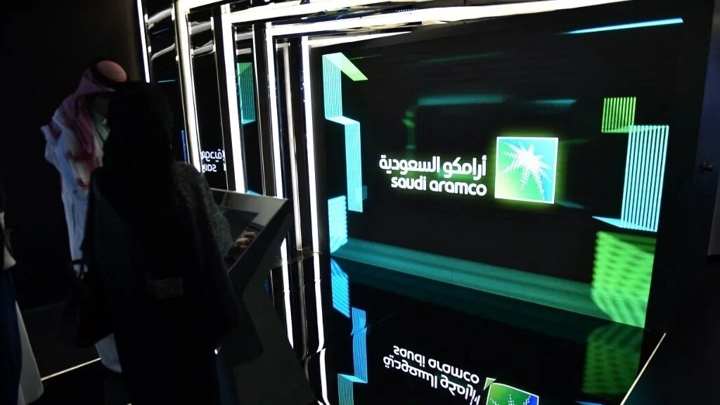 Visitors stop at the Aramco exhibition section at the Misk Global Forum on innovation and technology held in the Saudi capital Riyadh on November 13 2019 (Fayez Nureldine/AFP)