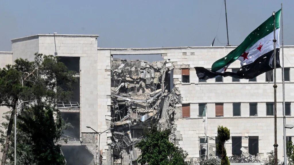 A picture shows a view of the damage following Israeli strikes on the Syrian army and defence ministry headquarters in Damascus on July 16 2025 (Louai Beshara / AFP)