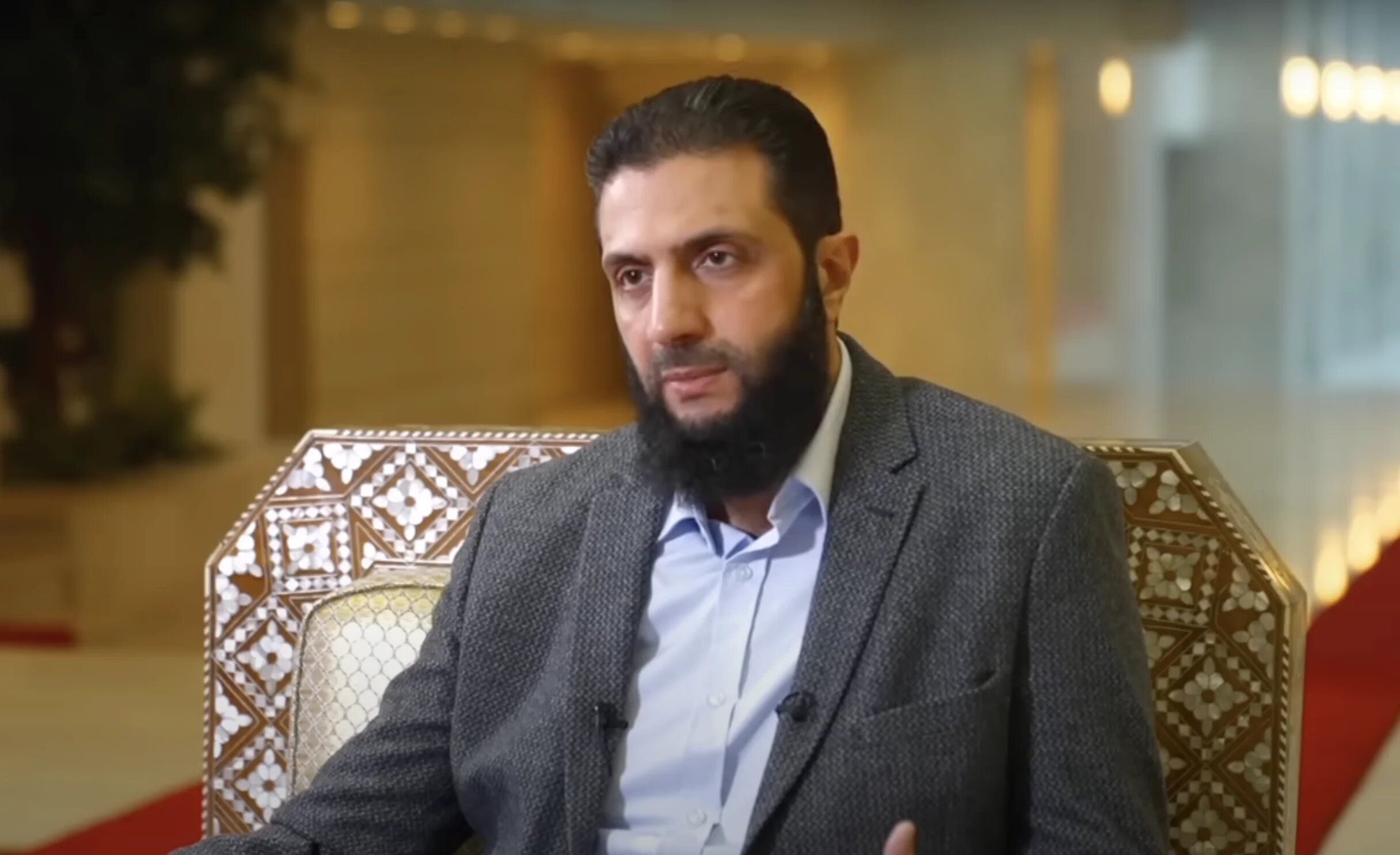 BBC International Editor Jeremy Bowen interviews Ahmed al-Sharaa in Damascus, December 19, 2024. (Credit: BBC screenshot)