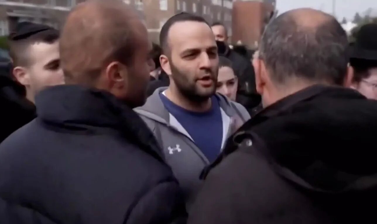 Special Constable David Soffer seen in a crowd that surrounded an Al Jazeera film crew in Golders Green. (Screengrab/X/MEE)